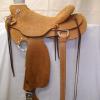 Saddle #4514.  58 Wade tree, 15 1/2" seat, all rough out.  Flat plate rigging, wood post horn 3 1/4" high x 5".  Cheyenne roll.