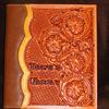 Custom made photo album; "Trine's Family" with floral carving & basket stamp.