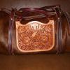 Hair-on cow hide duffel bag with elk head